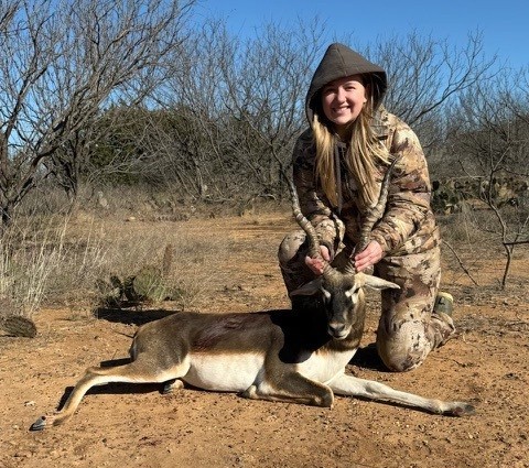 Kid with whitetail